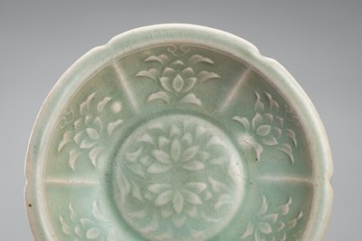 Lot 950 - THREE SMALL CELADON GLAZED AND MOLDED PORCELAIN DISHES, 12TH CENTURY