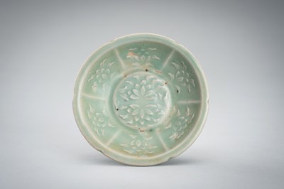 Lot 950 - THREE SMALL CELADON GLAZED AND MOLDED PORCELAIN DISHES, 12TH CENTURY
