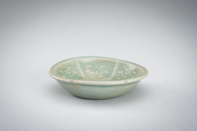 Lot 950 - THREE SMALL CELADON GLAZED AND MOLDED PORCELAIN DISHES, 12TH CENTURY
