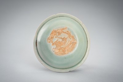 Lot 950 - THREE SMALL CELADON GLAZED AND MOLDED PORCELAIN DISHES, 12TH CENTURY