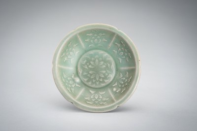 Lot 950 - THREE SMALL CELADON GLAZED AND MOLDED PORCELAIN DISHES, 12TH CENTURY