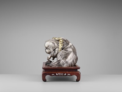 Lot 36 - MARUKI COMPANY: AN EXCEPTIONAL AND LARGE PARCEL-GILT AND SILVERED OKIMONO OF A CHIN DOG