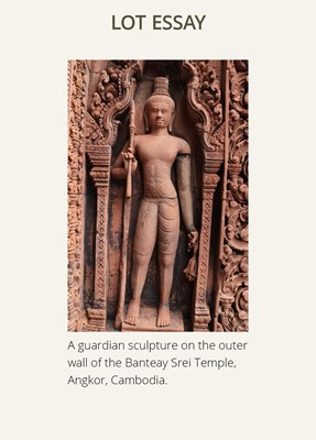 Lot 341 - A RED SANDSTONE ‘GUARDIAN DEITY’ ANTEFIX, BANTEAY SREI