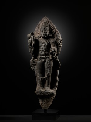 Lot 275 - A MONUMENTAL GRANITE FIGURE OF SHIVA AS BHAIRAVA, CHOLA PERIOD