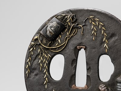 Lot 210 - A RARE IRON TSUBA DEPICTING IEMON AND THE GHOST OF OIWA