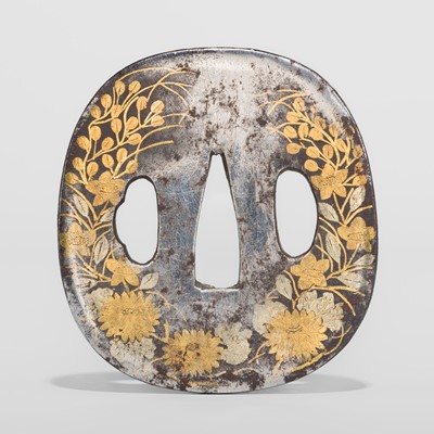 Lot 58 - A FINE SILVERED IRON TSUBA WITH AUTUMNAL FLOWERS