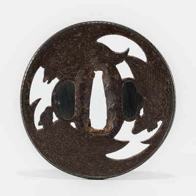 Lot 604 - AN IRON SUKASHI TSUBA WITH MINOGAME