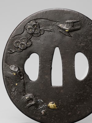 Lot 211 - JOCHIKU: AN IRON TSUBA DEPICTING A TARTAR ARCHER