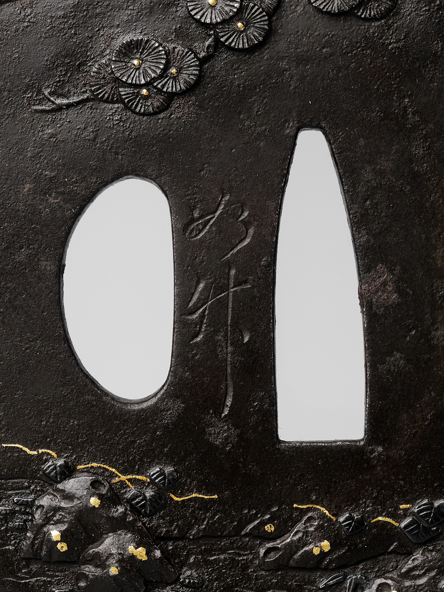 Lot 211 - JOCHIKU: AN IRON TSUBA DEPICTING A TARTAR