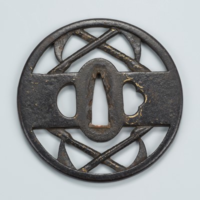 Lot 1478 - AN IRON SUKASHI TSUBA WITH SICKLES