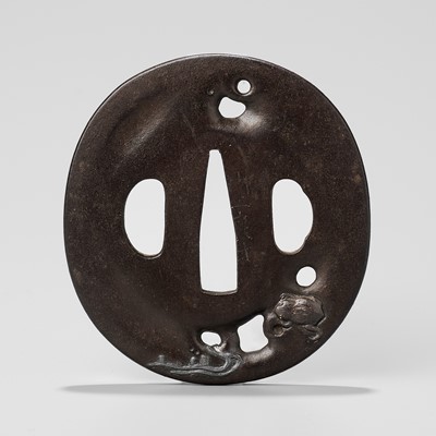 Lot 201 - KAWAKAMI YOSHICHIKA: AN IRON SUKASHI TSUBA DEPICTING A FROG BY A SILVER STREAM