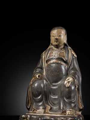 Lot 553 - A RARE CIZHOU PAINTED FIGURE OF ZHENWU, YUAN TO EARLY MING DYNASTY, 14TH-15TH CENTURY