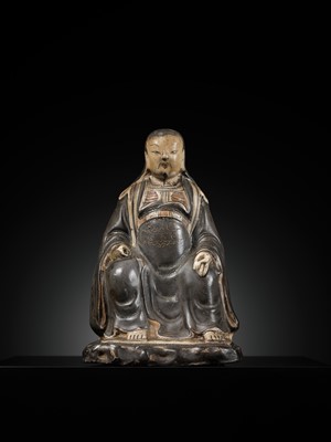 Lot 553 - A RARE CIZHOU PAINTED FIGURE OF ZHENWU, YUAN TO EARLY MING DYNASTY, 14TH-15TH CENTURY