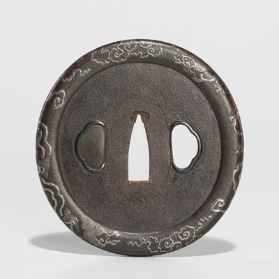 Lot 204 - A FINE IRON TSUBA WITH SILVER RAIN DRAGONS