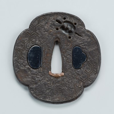 Lot 1549 - AN IRON SUKASHI TSUBA WITH HONEYCOMB AND FAN