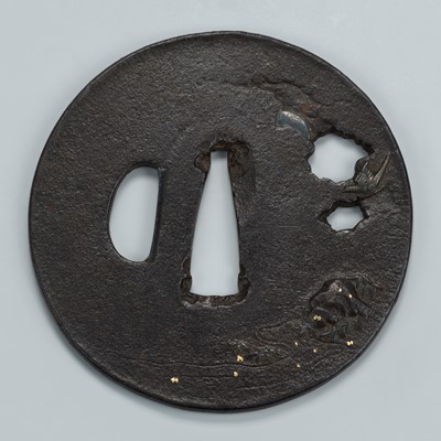 Lot 1548 - AN IRON SUKASHI TSUBA DEPICTING A MOONLIT RIVER ON A CLOUDY NIGHT