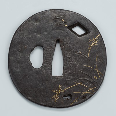 Lot 1554 - KANEIE: AN IRON SUKASHI TSUBA DEPICTING GEESE AND SUSUKI (PLUME GRASS)