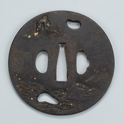 Lot 1533 - UMETADA CHIKASHIGE: AN IRON TSUBA WITH LANDSCAPE AND OPENWORK MOTIFS