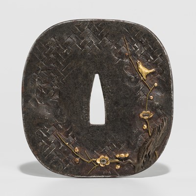 Lot 616 - SEKIJOKEN MOTOZANE: AN IRON TSUBA DEPICTING A WINTER SCENE OF A BIRD IN A PLUM TREE