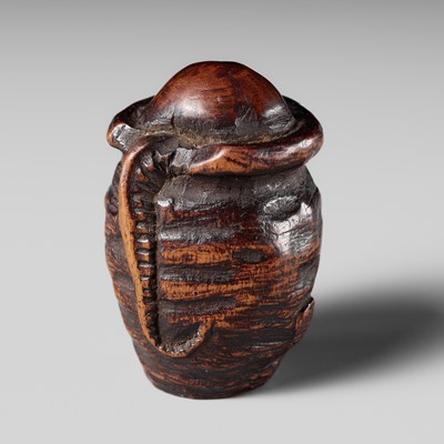 Lot 463 - A FINE NAGOYA SCHOOL WOOD NETSUKE OF A TAKOTSUBO, OCTOPUS POT