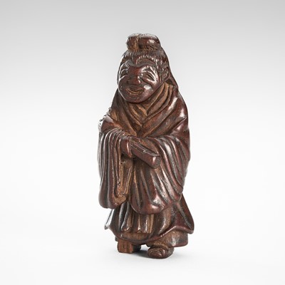Lot 324 - AN OLD WOOD NETSUKE OF KANZAN