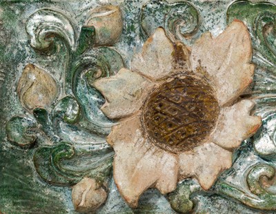 A LARGE GREEN-GLAZED ARCHITECTURAL POTTERY TILE DEPICTING LOTUS BLOSSOMS, MING DYNASTY