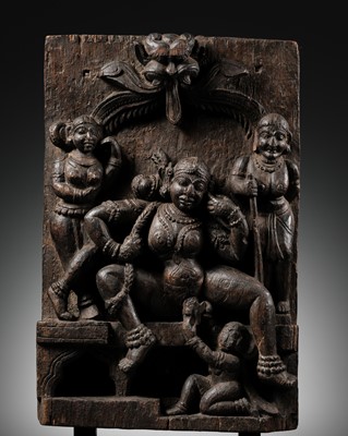 A RARE WOOD CARVING OF WOMAN GIVING BIRTH, TAMIL NADU, 18TH CENTURY