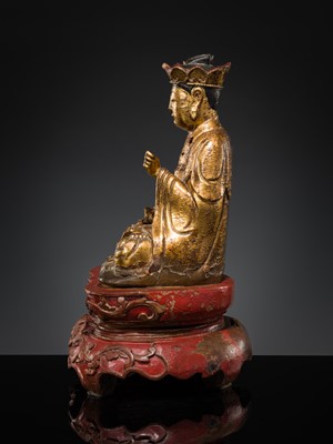 Lot 404 - A GILT-LACQUER WOOD FIGURE OF BUDDHA, VIETNAM, 17TH-18TH CENTURY