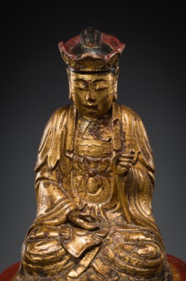 Lot 404 - A GILT-LACQUER WOOD FIGURE OF BUDDHA, VIETNAM, 17TH-18TH CENTURY