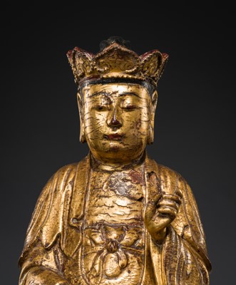 Lot 404 - A GILT-LACQUER WOOD FIGURE OF BUDDHA, VIETNAM, 17TH-18TH CENTURY