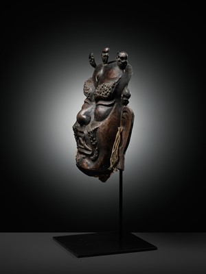 Lot 11 - A COPPER REPOUSSÉ RITUAL MASK OF MAHAKALA, 19TH CENTURY