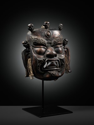 Lot 11 - A COPPER REPOUSSÉ RITUAL MASK OF MAHAKALA, 19TH CENTURY