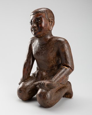 A BURMESE LACQUERED WOOD FIGURE OF A BUDDHIST DISCIPLE, C. 1900s