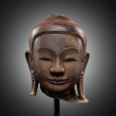 A LARGE LACQUERED PINK SANDSTONE HEAD OF BUDDHA, AVA STYLE, BURMA, 17TH CENTURY