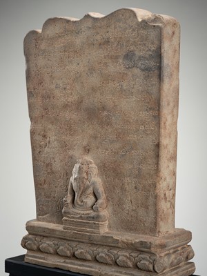 Lot 1008 - A KHMER STYLE SANDSTONE STELE WITH INSCRIPTION