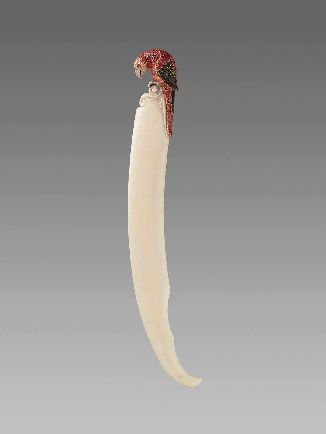 Lot 95 - A DECORATIVE IVORY DAGGER WITH A LONG-TAILED PARROT