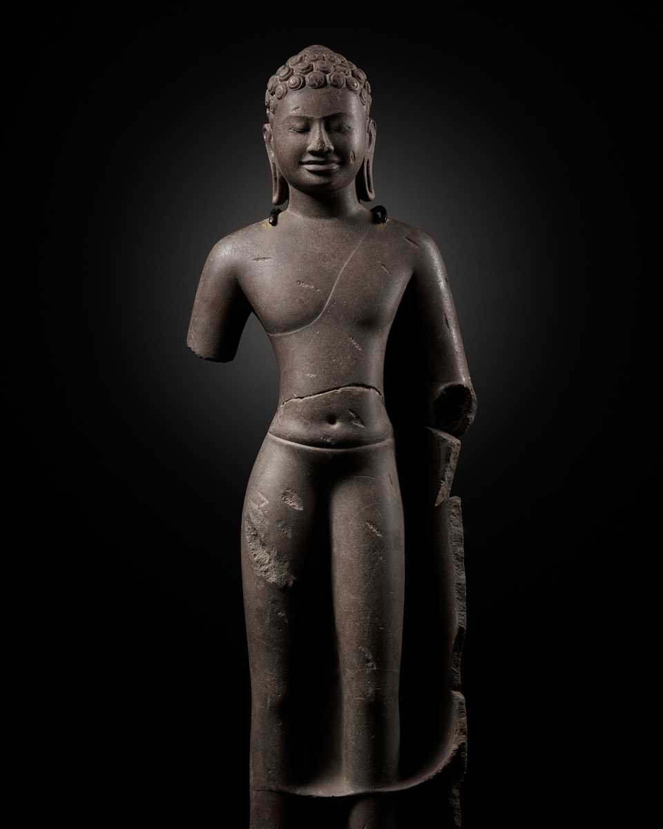 Lot 339 - A LARGE SANDSTONE FIGURE OF BUDDHA, ANGKOR BOREI