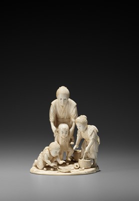 Lot 162 - EISHIN: AN IVORY OKIMONO OF AN OLD WOMAN AND CHILDREN COLLECTING SHELLS