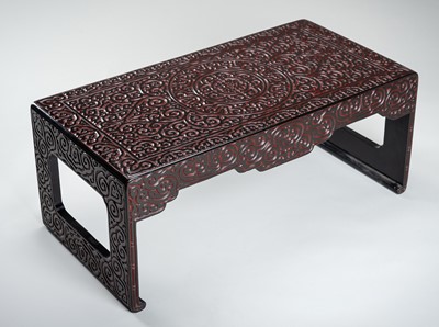 Lot 1670 - A CHINESE GURI LACQUER LOW TABLE, 19th CENTURY