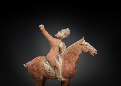 Lot 129 - A RARE PAIR OF FOREIGN EQUESTRIAN ARCHERS, PAINTED POTTERY, TANG DYNASTY