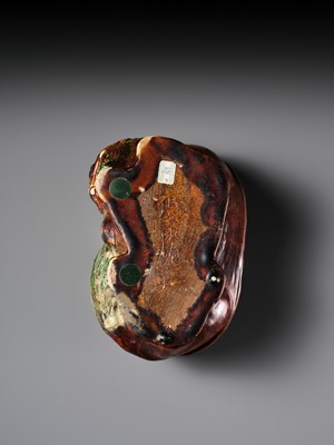 Lot 537 - A SANCAI GLAZED POTTERY ‘LION’ PILLOW, LIAO TO JIN DYNASTY