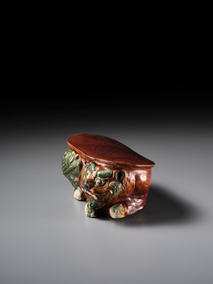 Lot 537 - A SANCAI GLAZED POTTERY ‘LION’ PILLOW, LIAO TO JIN DYNASTY