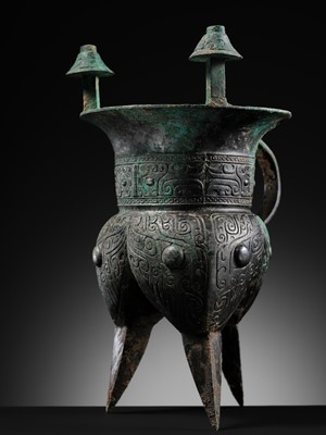 Lot 55 - A RARE AND IMPORTANT BRONZE RITUAL TRIPOD VESSEL, JIA, SHANG DYNASTY