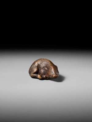 Lot 140 - TAMETAKA: A SUPERB WOOD NETSUKE OF A BOAR RESTING ON AUTUMN LEAVES