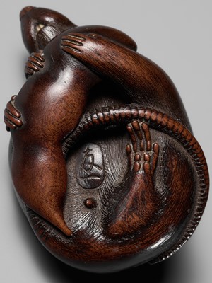 Lot 147 - KANO TOMOKAZU: A SUPERB WOOD NETSUKE OF A RAT WITH EDAMAME BEAN POD