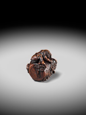 Lot 152 - A FINE NAGOYA SCHOOL WOOD NETSUKE OF RAIJIN SLEEPING ON HIS THUNDER DRUM