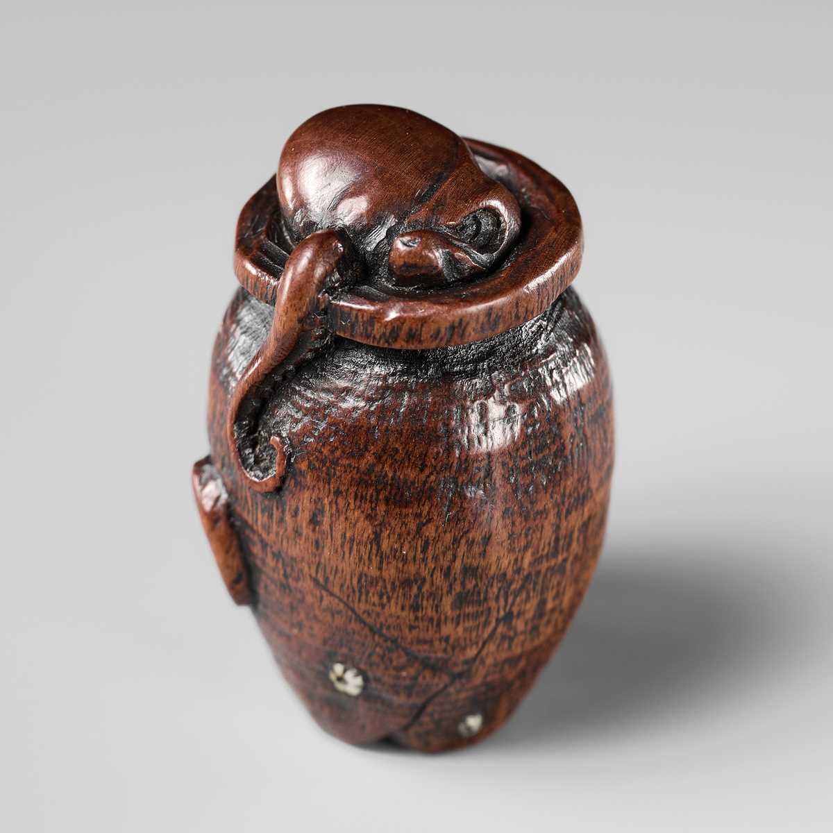 Lot 171 - ISSAI: A FINE NAGOYA SCHOOL WOOD NETSUKE OF A TAKOTSUBO, OCTOPUS POT