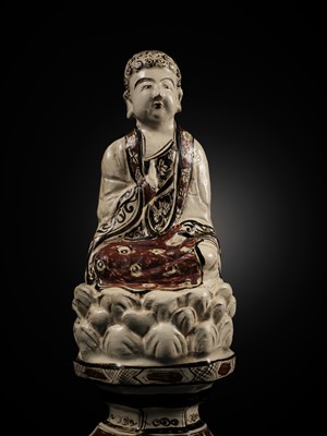 Lot 145 - A RARE AND LARGE CIZHOU POLYCHROME POTTERY FIGURE OF BUDDHA, JIN DYNASTY