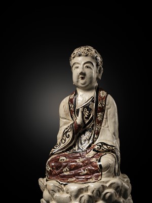 Lot 145 - A RARE AND LARGE CIZHOU POLYCHROME POTTERY FIGURE OF BUDDHA, JIN DYNASTY