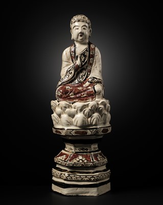 Lot 145 - A RARE AND LARGE CIZHOU POLYCHROME POTTERY FIGURE OF BUDDHA, JIN DYNASTY